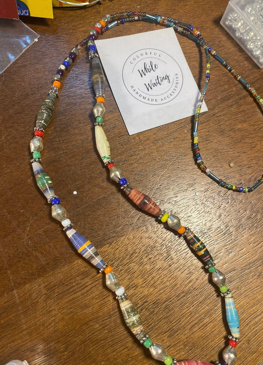 While Waiting multi colored paper bead necklace.