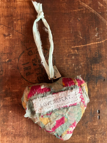 "Love. Repeat."  Ornament