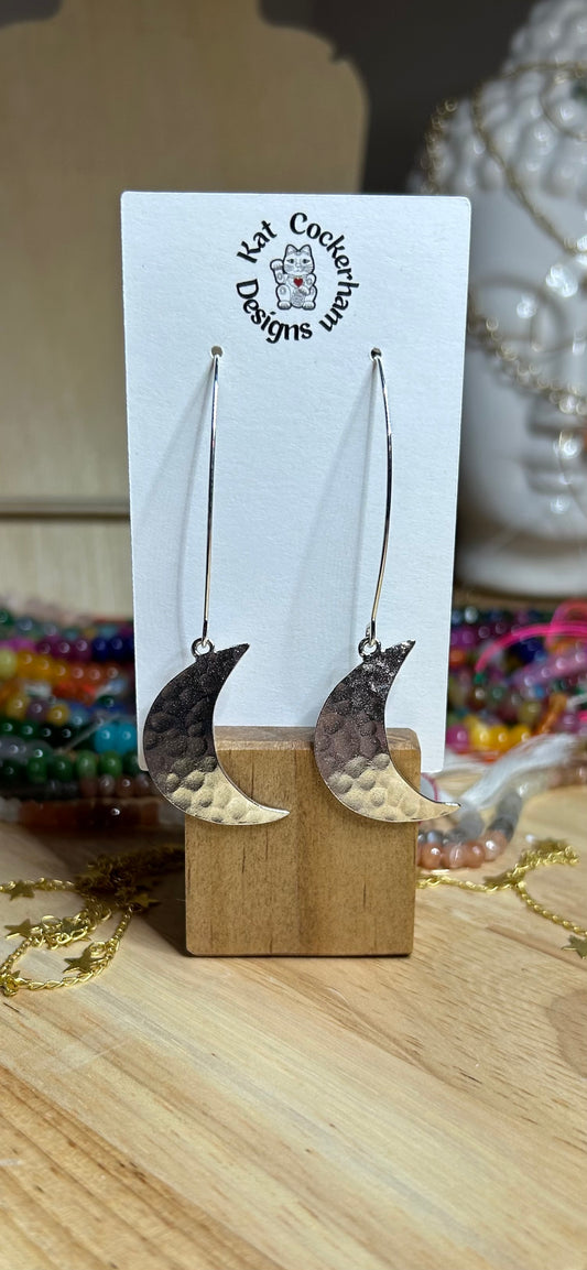 Silver long hammered moon earrings