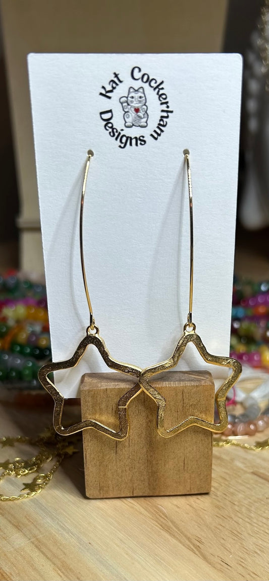 Gold plate long star earrings