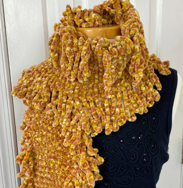 Caramel hand knitted scarf with fringe